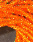 Micro Pearl Core Braid by Hareline Dubbin, Inc in bright orange for detailed fly tying at Freestone Fly Shop