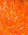 UV Polar Chenille fibers dyed in vibrant orange hues with subtle iridescence by Hareline Dubbin, Inc for fly tying