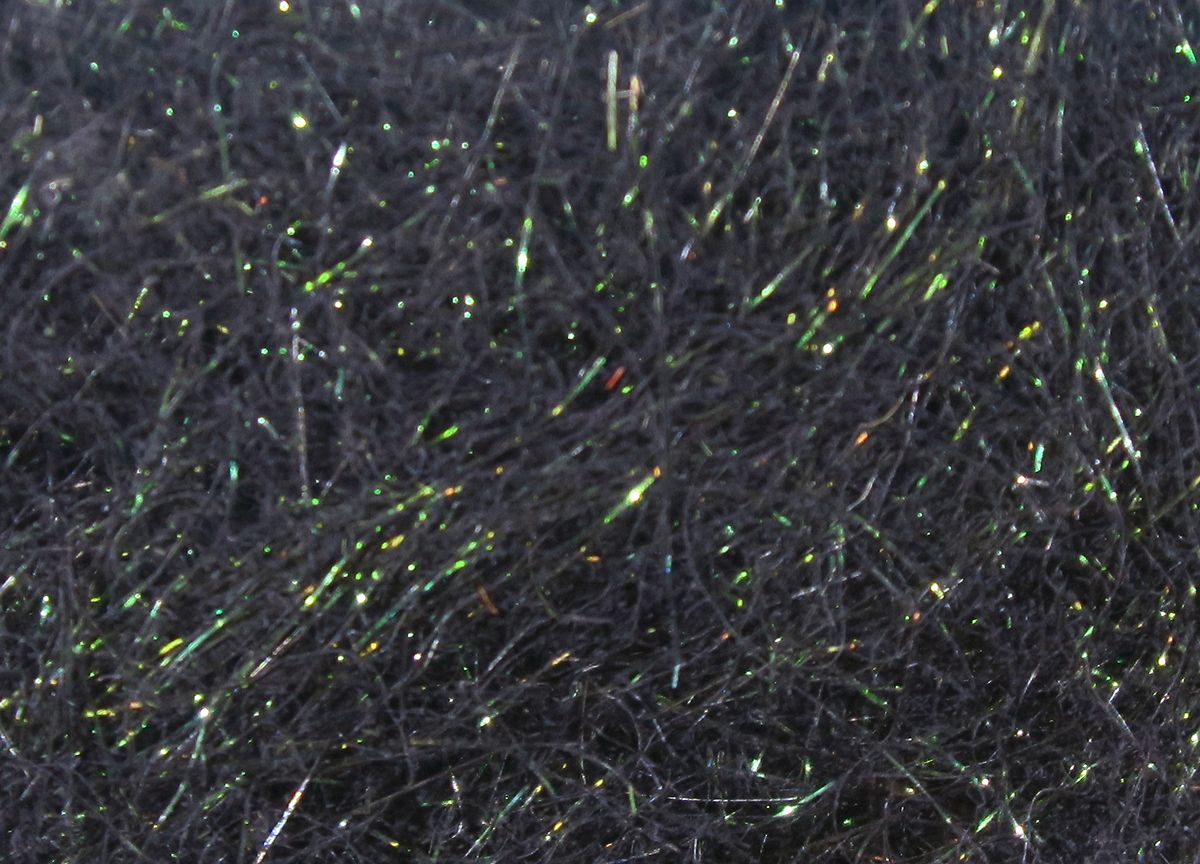 Hare's Ice Dub fibers in deep black shade with subtle iridescent highlights for fly tying at Freestone Fly Shop