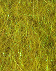 Hare's Ice Dub fibers in golden olive shade with reflective strands for fly tying at Freestone Fly Shop