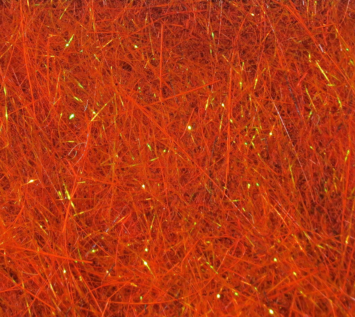 Hare's Ice Dub fibers in vivid copper tones with fine reflective strands for fly tying at Freestone Fly Shop