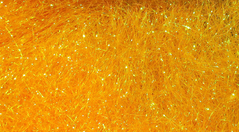 Ice Dub fibers in bright orange with sparkling iridescence by Hareline Dubbin, Inc at Freestone Fly Shop for fly tying