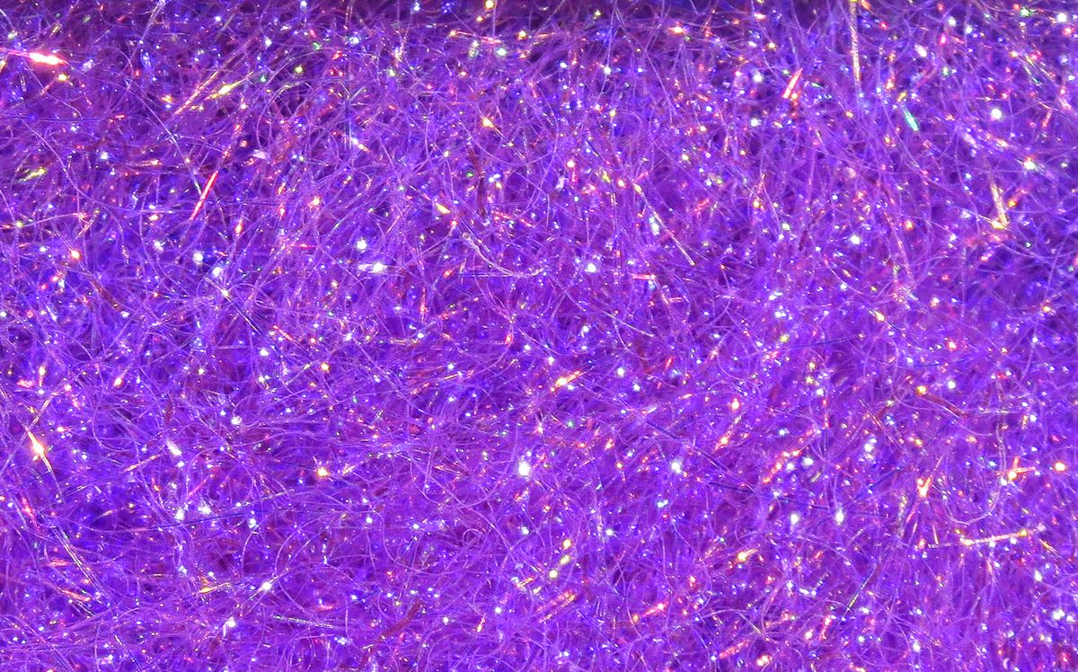 Ice Dub fibers in luminous violet shades with sparkling highlights by Hareline Dubbin, Inc at Freestone Fly Shop for fly tying