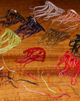 Mini Squiggle Worms by Hareline Dubbin Inc in assorted colors for fly fishing at Freestone Fly Shop