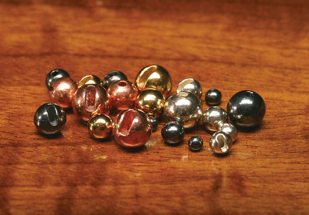 Slotted Tungsten Beads by Hareline Dubbin, Inc for precise fly tying at Freestone Fly Shop with varied metallic finishes